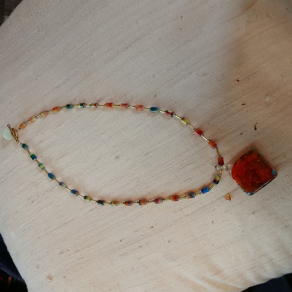 Necklace glass